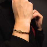 Women’s Protection & Power Red Pyrope Garnet Wristband with Evil Eye CZ Charm and Gold